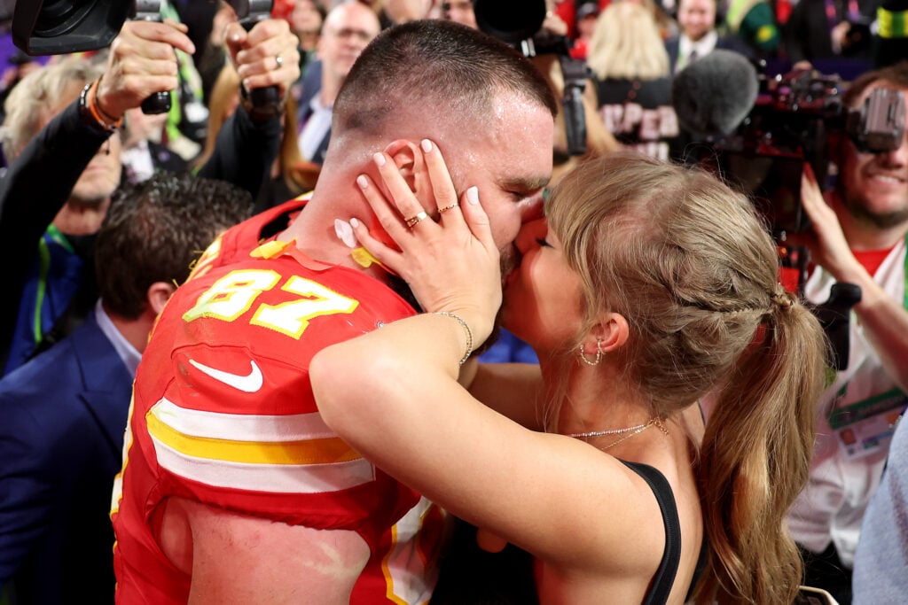 Taylor Swift kisses Travis Kelce on February 11, 2024.