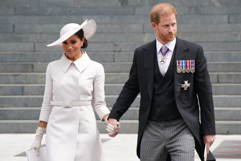 Prince Harry, Duke of Sussex and Meghan, Duchess of Sussex leave after the National Service of Thanksgiving to Celebrate the Platinum Jubilee of Her Majesty The Queen at St Paul's Cathedral on June 3, 2022 in London, England.  