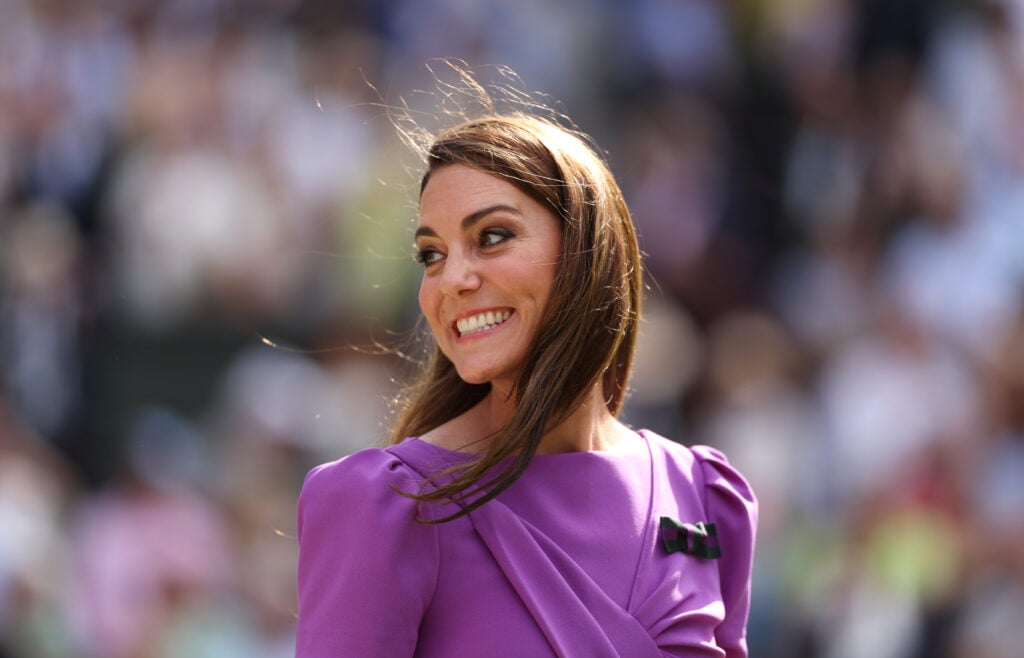 Catherine, Princess of Wales, Patron of The AELTC smiles prior to presenting Carlos Alcaraz of Spain with his trophy following victory against Novak Djokovic during day fourteen of The Championships Wimbledon 2024.