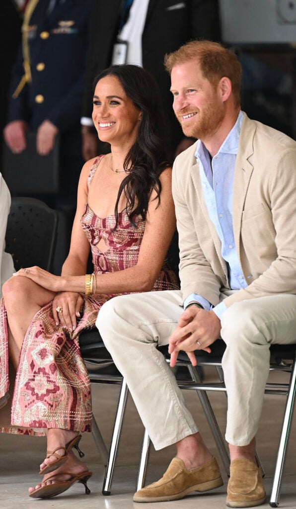 Britain's Prince Harry, Duke of Sussex, and his wife Meghan Markle are pictured during a visit to the National Centre for the Arts in Bogota on August 15, 2024. Prince Harry and his wife, American actress Meghan Markle, arrived in Colombia at the invitation of Colombia's vice-President Francia Marquez, with whom they will attend various meetings with women and young people to reject discrimination and cyberbullying.