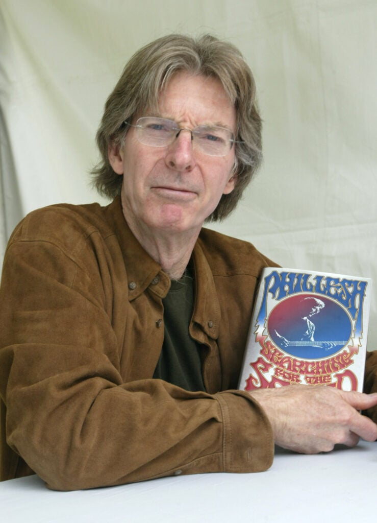 Phil Lesh of the Grateful Dead holds a copy of his book, "Searching for the Sound: My Life with the Grateful Dead" at the 10th annual Los Angeles Times Festival of Books at UCLA on April 24, 2005 in Los Angeles, California. 