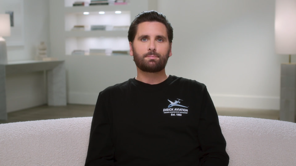 Scott Disick wears a black shirt to speak to the confessional camera.