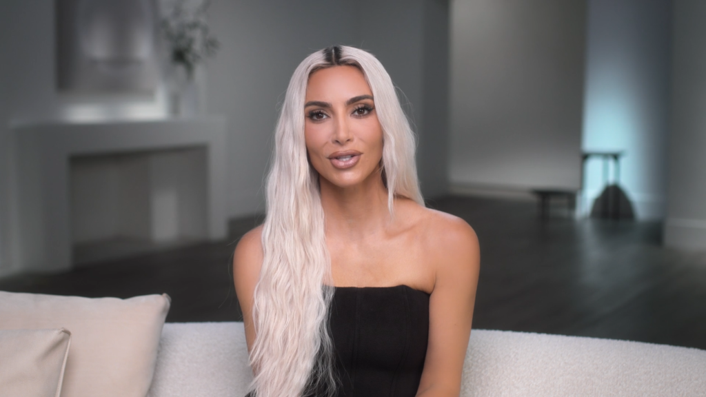 Kim Kardashian with platinum blonde hair on The Kardashians.