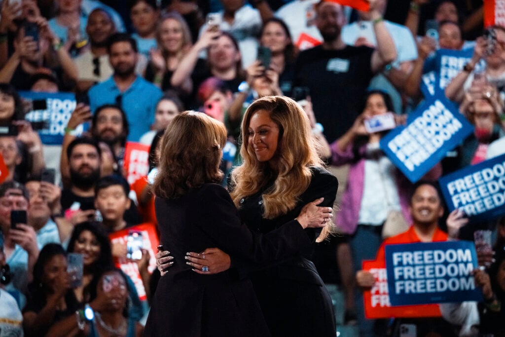 Kamala Harris and Beyonce embrace on October 25, 2024.