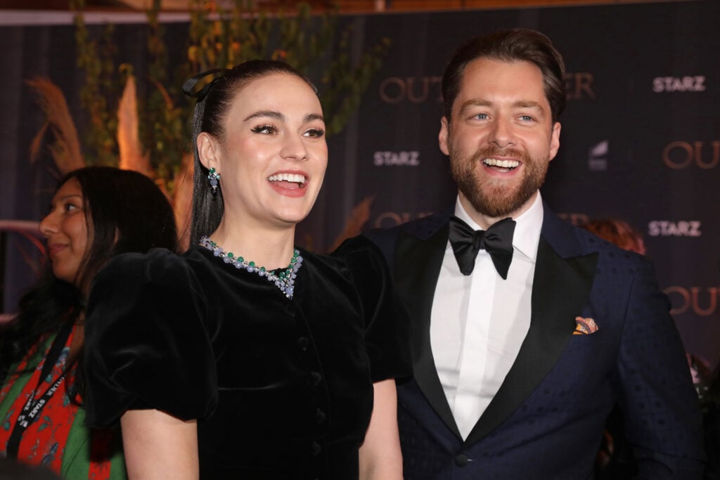 Sophie Skelton and Richard Rankin on February 24, 2022 while all dressed up.