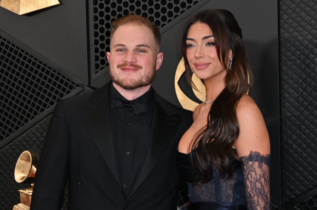 Zach Bryan and girlfriend Brianna Chickenfry arrive for the 66th Annual Grammy Awards at the Crypto.com Arena in Los Angeles on February 4, 2024.
