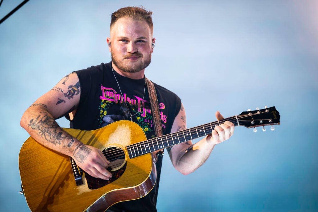 Zach Bryan performs during the Quittin Time tour at Nissan Stadium on June 29, 2024 in Nashville, Tennessee.