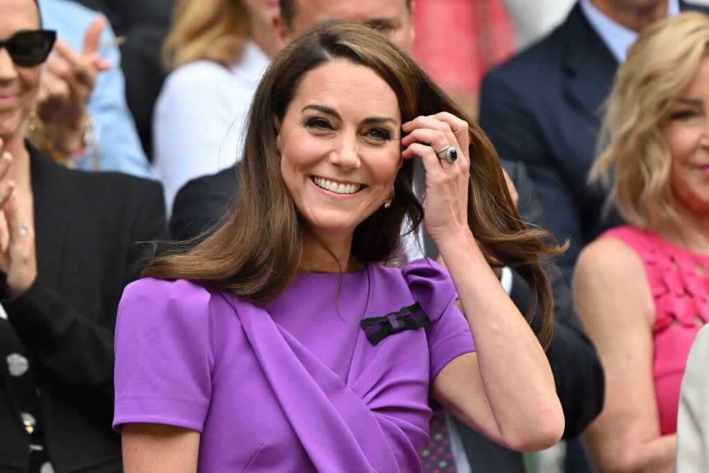 Catherine, Princess of Wales reacts as she arrives in the Royal Box on Centre Court to attend the men's singles final tennis match on the fourteenth day of the 2024 Wimbledon Championships at The All England Lawn Tennis and Croquet Club in Wimbledon, southwest London, on July 14, 2024.