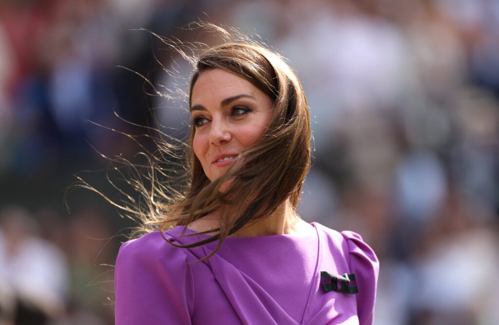 Catherine, Princess of Wales, Patron of The AELTC looks on prior to presenting Carlos Alcaraz of Spain with his trophy following victory against Novak Djokovic of Serbia in the Gentlemen's Singles Final during day fourteen of The Championships Wimbledon 2024 at All England Lawn Tennis and Croquet Club on July 14, 2024 in London, England. 