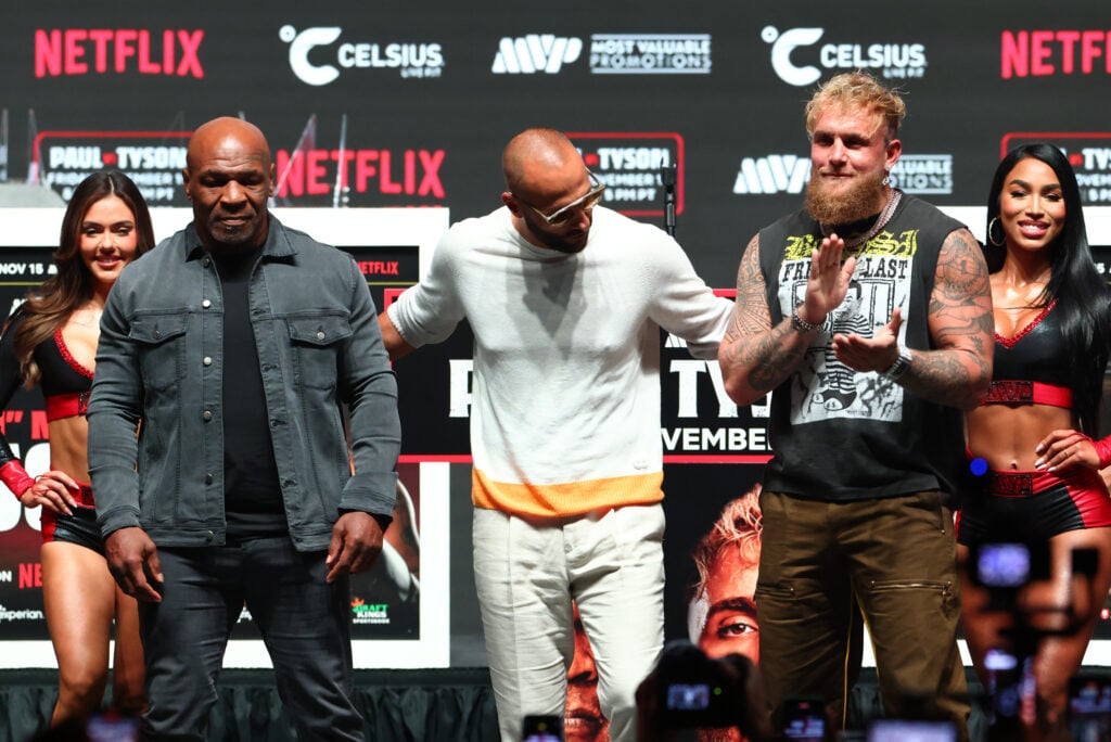 Jake Paul and Mike Tyson pose after the final press conference for their upcoming heavyweight fight at Toyota Music Factory on November 13, 2024 in Irving, Texas.