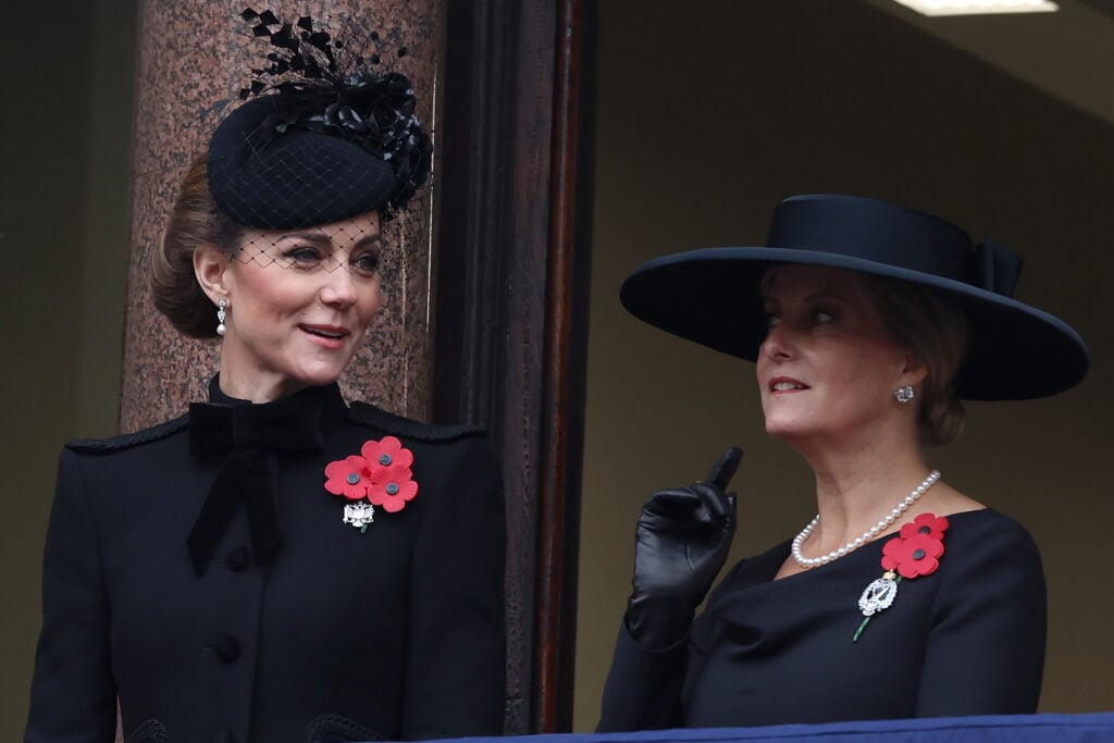 Catherine Princess of Wales and Sophie, Duchess of Edinburgh stand from the balcony during the National Service of Remembrance at The Cenotaph on November 10, 2024 in London, England.