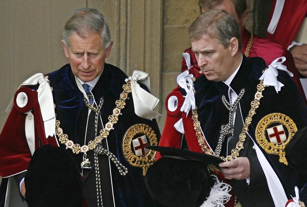 Britain's Prince Charles and Prince Andrew depart after attending the Garter service at St George's Chapel at Windsor Castle, in Windsor, in south-east England, 18 June 2007. 