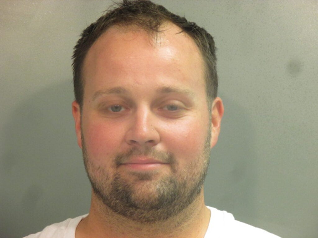 In this handout photo provided by the Washington County Sheriffâs Office, former television personality on "19 Kids And Counting" Josh Duggar poses for a booking photo after his arrest April 29, 2021 in Fayetteville, Arkansas.