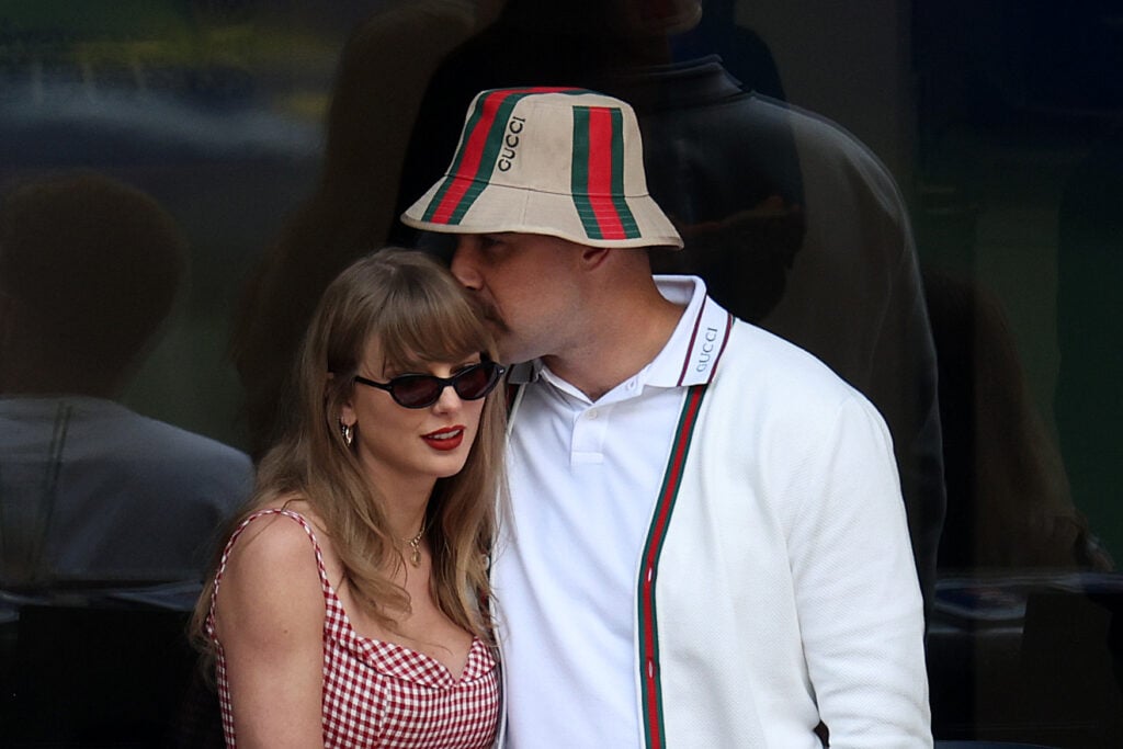 Singer-songwriter Taylor Swift and Travis Kelce of the Kansas City Chiefs attend the Men's Singles Final match between Taylor Fritz of the United States and Jannik Sinner of Italy on Day Fourteen of the 2024 US Open at USTA Billie Jean King National Tennis Center on September 08, 2024 in the Flushing neighborhood of the Queens borough of New York City.