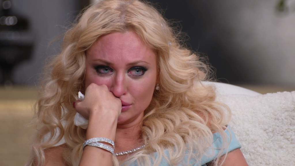 Natalie Mordovtseva cries while turning red in the face.