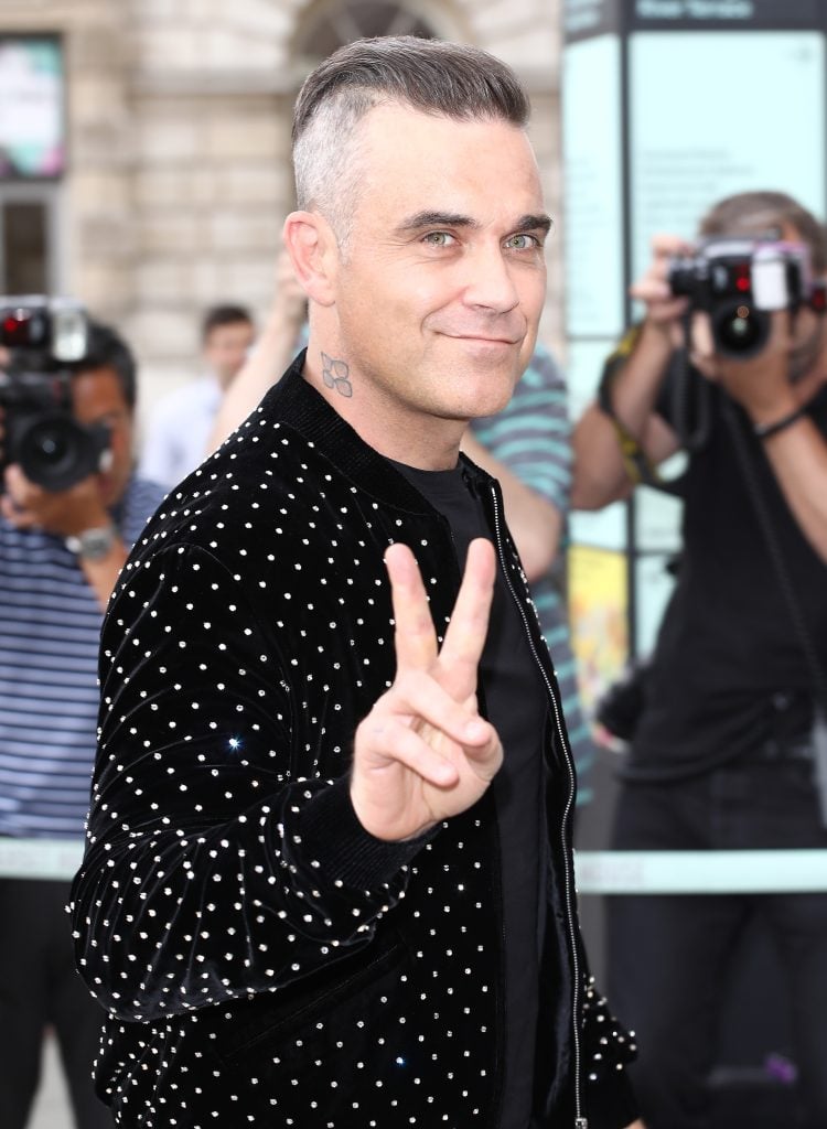 Robbie Williams attends The X Factor 2018 launch at Somerset House on July 17, 2018 in London, England.