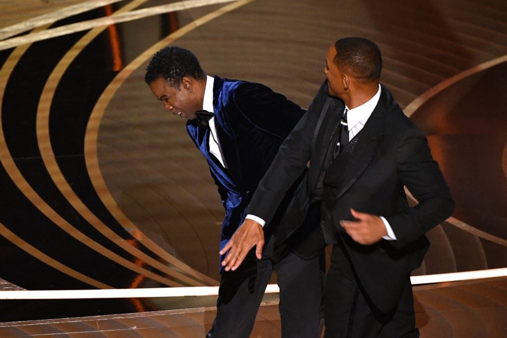 US actor Will Smith slaps US actor Chris Rock onstage during the 94th Oscars at the Dolby Theatre in Hollywood, California on March 27, 2022.