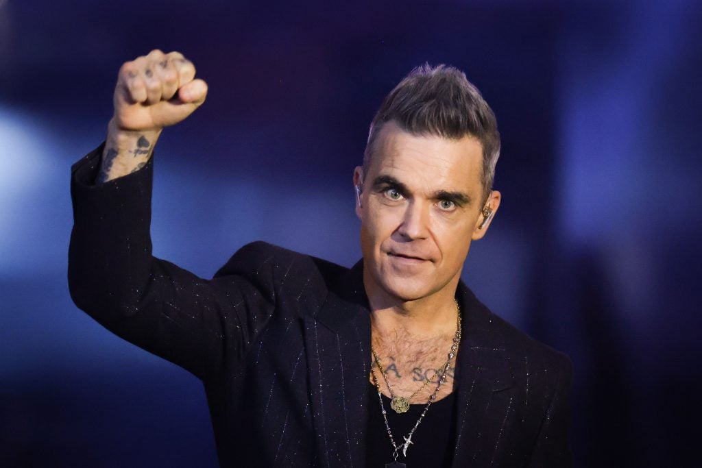 Robbie Williams performs on stage during the "Wetten, dass...?" Live Show on November 19, 2022 in Friedrichshafen, Germany.