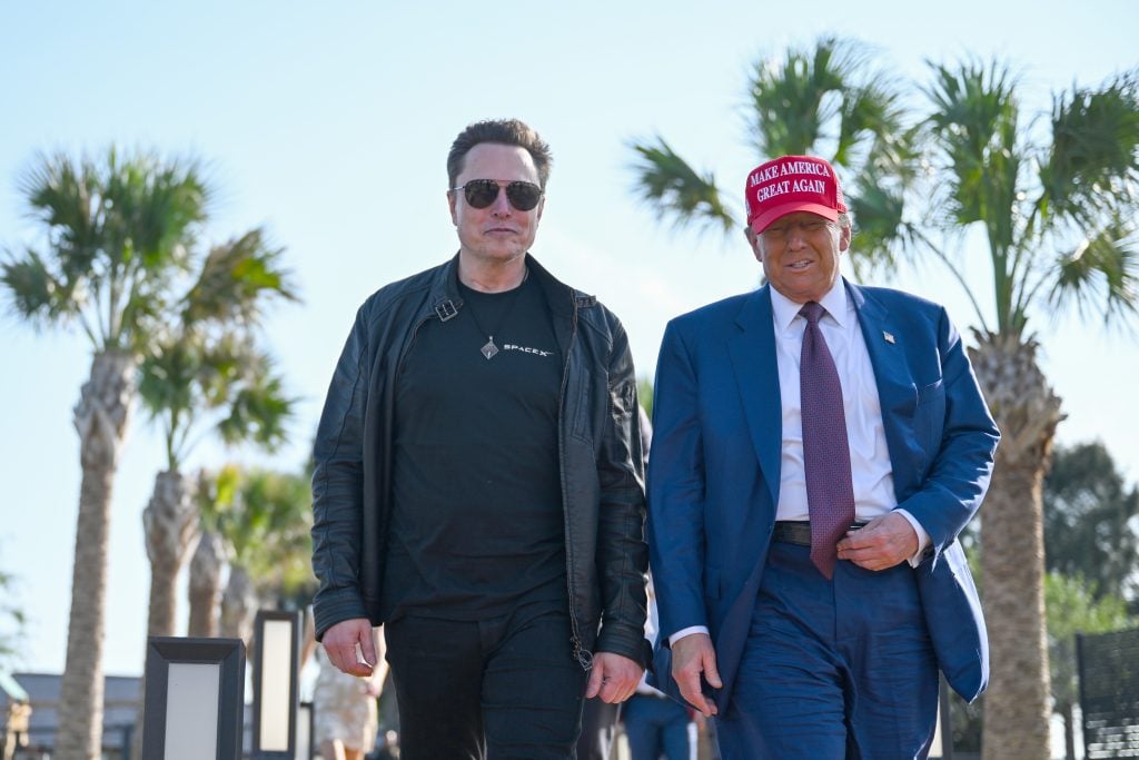U.S. President-elect Donald Trump greets Elon Musk as he arrives to attend a viewing of the launch of the sixth test flight of the SpaceX Starship rocket on November 19, 2024 in Brownsville, Texas.