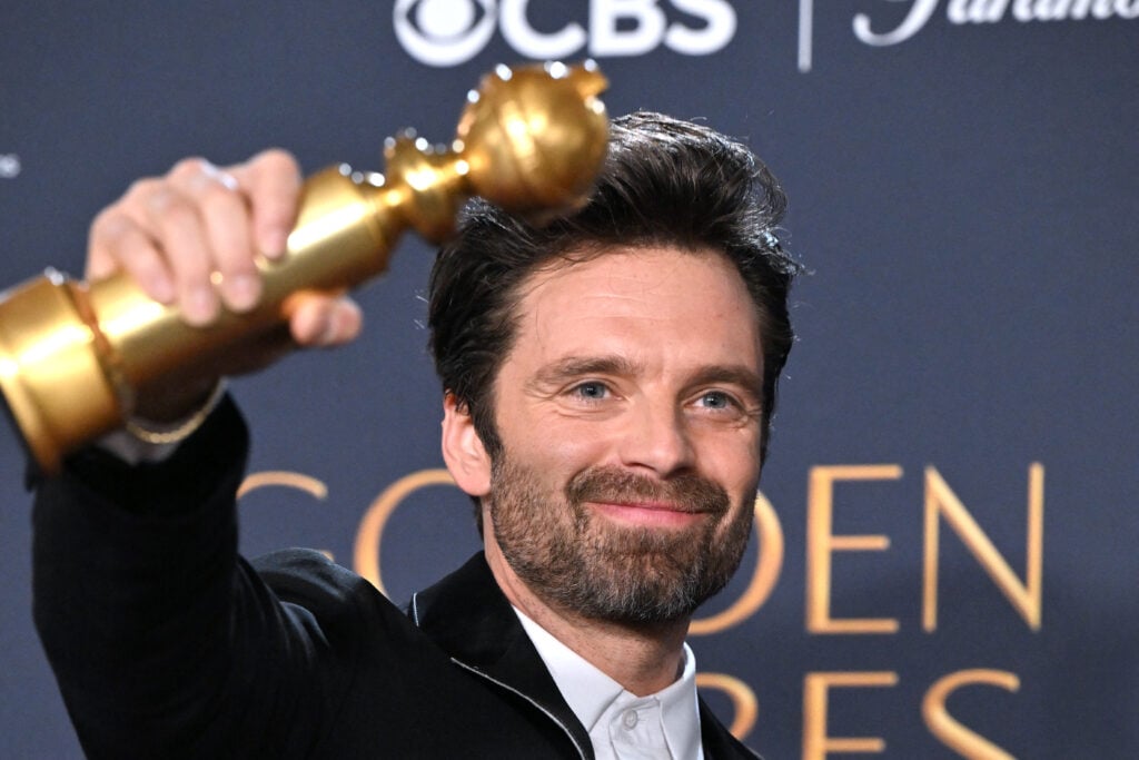 US actor Sebastian Stan poses with the Best Performance by a Male Actor in a Motion Picture Musical or Comedy award for "A Different Man" in the press room during the 82nd annual Golden Globe Awards at the Beverly Hilton hotel in Beverly Hills, California, on January 5, 2025.