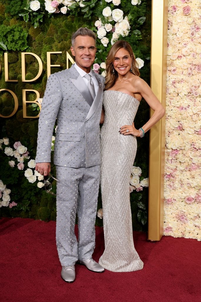 Robbie Williams and Ayda Field attend the 82nd Annual Golden Globe Awards at The Beverly Hilton on January 05, 2025 in Beverly Hills, California.