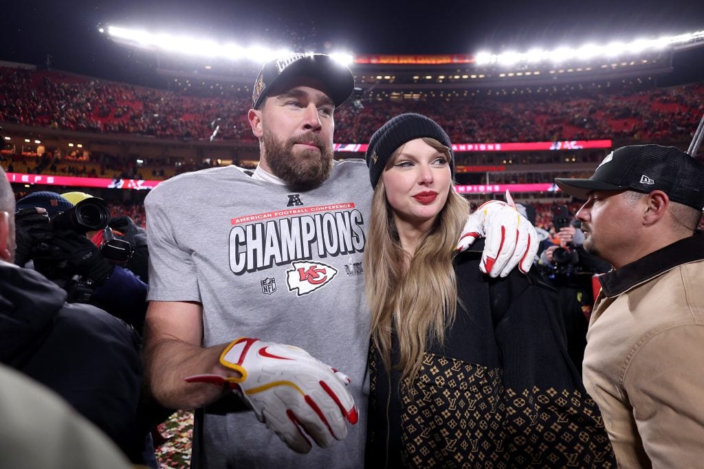 Taylor Swift celebrates with Travis Kelce #87 of the Kansas City Chiefs after defeating the Buffalo Bills 32-29 in the AFC Championship Game at GEHA Field at Arrowhead Stadium on January 26, 2025 in Kansas City, Missouri.