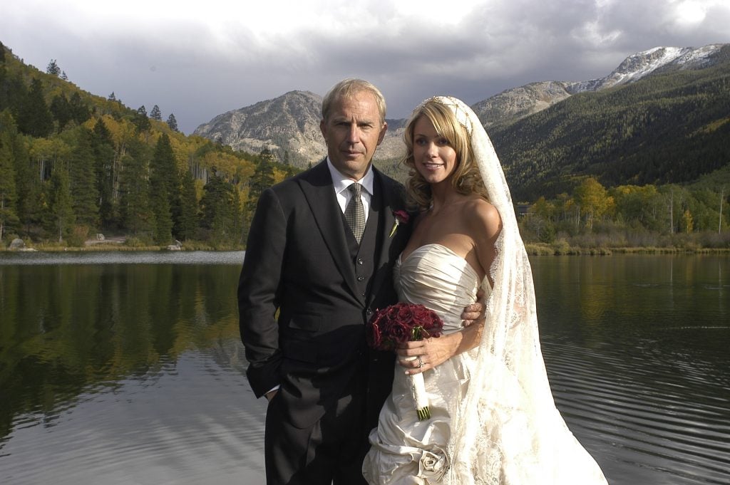 Kevin Costner poses with his new wife Christine Baumgartner during their private wedding at his ranch in September 25, 2004 in Aspen, Colorado.