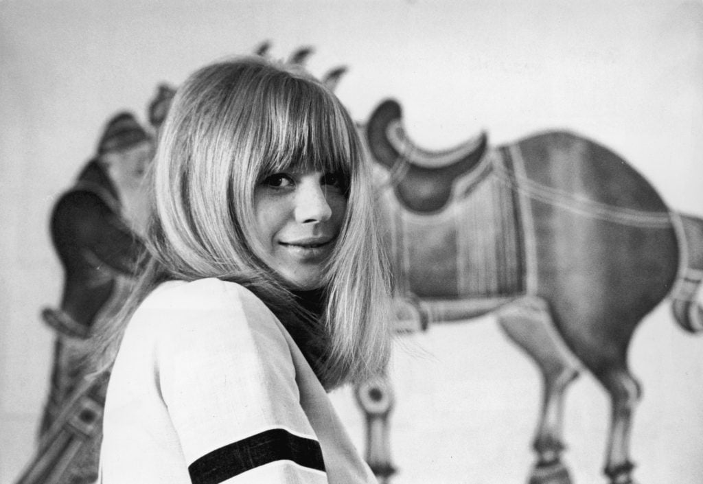 English singer Marianne Faithfull in her Kensington flat, 5th August 1965.