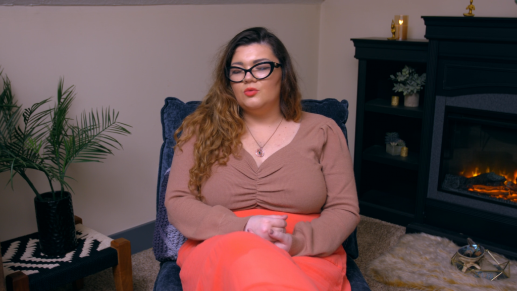 Amber Portwood sits and expresses regrets.