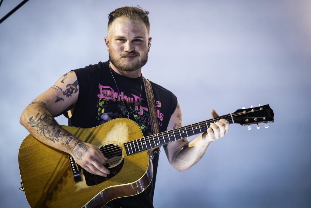 Zach Bryan performs during the Quittin Time tour at Nissan Stadium on June 29, 2024 in Nashville, Tennessee.
