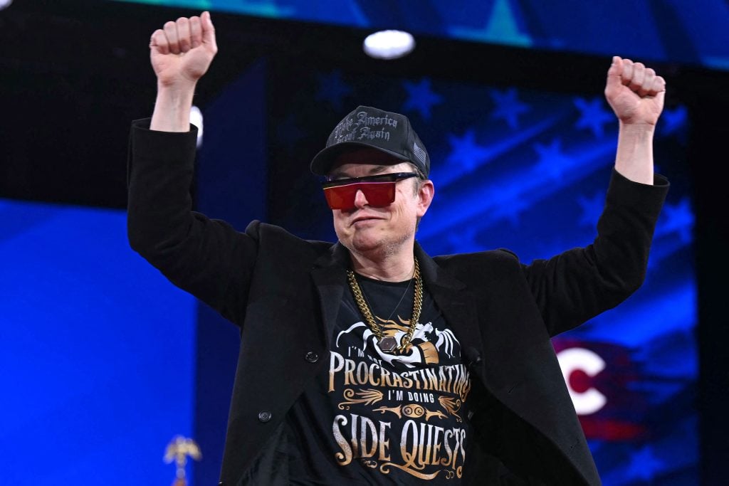Elon Musk walks on stage during the annual Conservative Political Action Conference (CPAC) at the Gaylord National Resort & Convention Center at National Harbor in Oxon Hill, Maryland, on February 20, 2025.