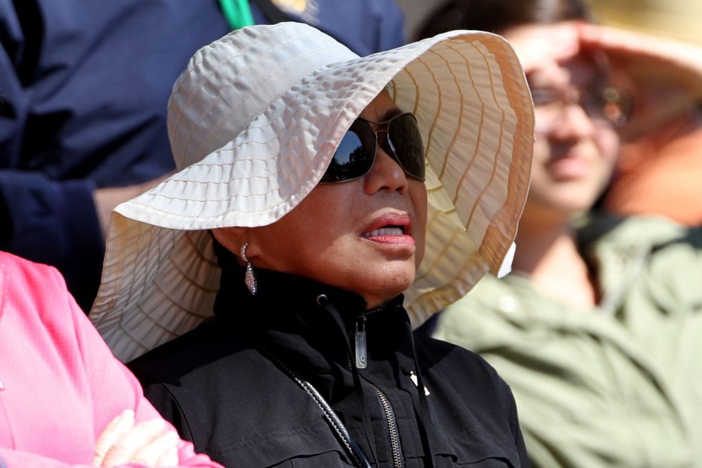 Mother of Tiger Woods, Kultida Woods, looks on from the gallery during the second round of the 2010 Masters Tournament at Augusta National Golf Club on April 9, 2010 in Augusta, Georgia.