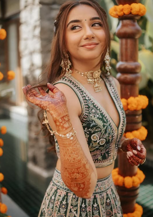 Prajakta Koli in custom Anita Dongre lehenga for Mehendi
