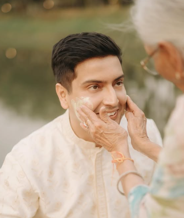 Vrishank Khanal getting Haldi put on