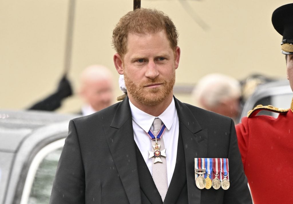 Prince Harry, Duke of Sussex arrives for the Coronation of King Charles III and Queen Camilla at Westminster Abbey on May 6, 2023 in London, England.