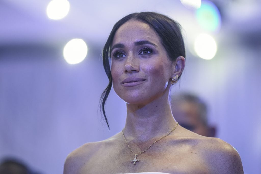 Meghan, Duchess of Sussex, looks on as she attends a Sit Out with Britain's Prince Harry (unseen), Duke of Sussex, at the Nigerian Defence Headquarters in Abuja on May 11, 2024 as they visit Nigeria as part of celebrations of Invictus Games anniversary.