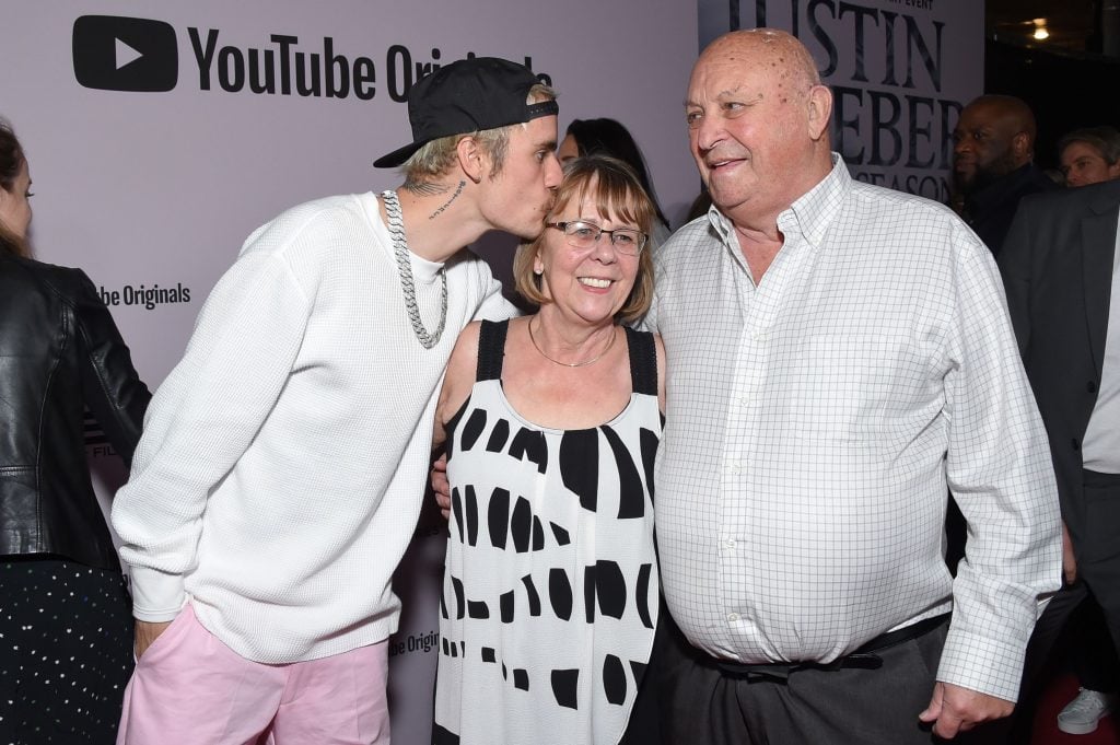 Canadian singer Justin Bieber, grandparents Diane Dale and Bruce Dale arrive for YouTube Originals' "Justin Bieber: Seasons" premiere at the Regency Bruin Theatre in Los Angeles on January 27, 2020.