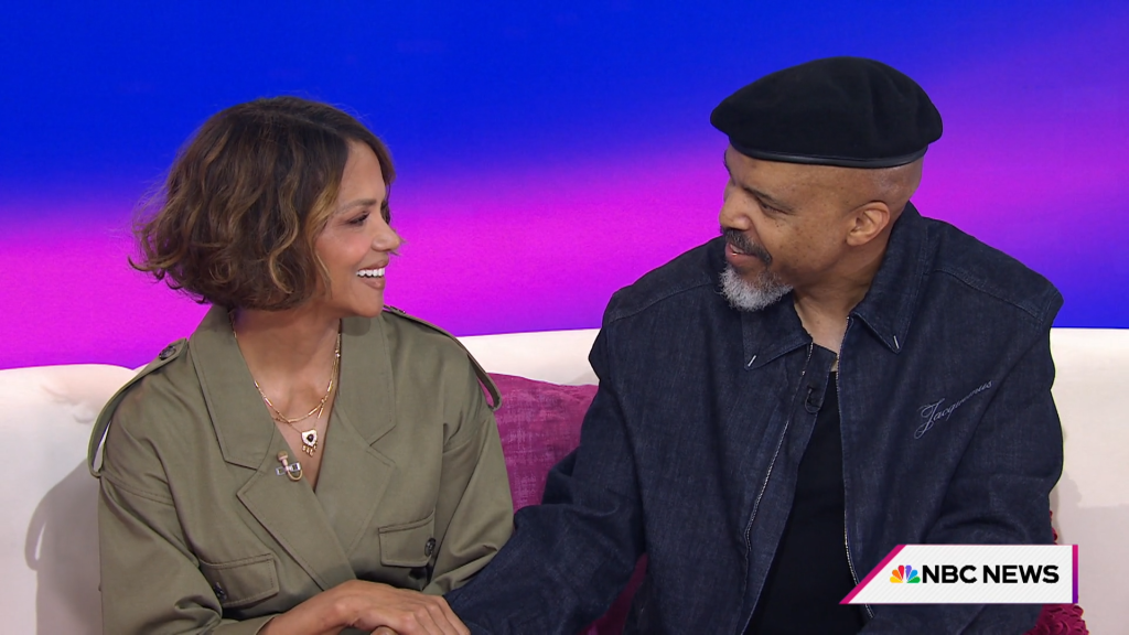 Van Hunt and Halle Berry gaze into each other's eyes.