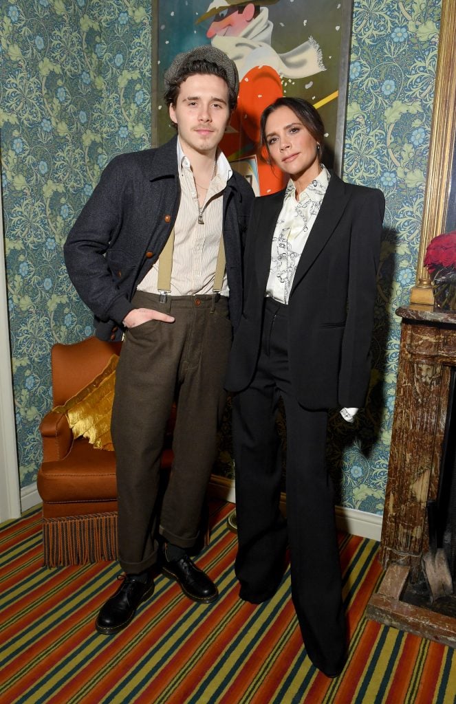 Brooklyn Beckham and his tiny mother Victoria Beckham in February of 2019.