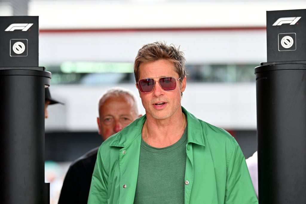 Brad Pitt, star of the upcoming Formula One based movie, Apex, walks in the Paddock after qualifying ahead of the F1 Grand Prix of Great Britain at Silverstone Circuit on July 08, 2023 in Northampton, England.