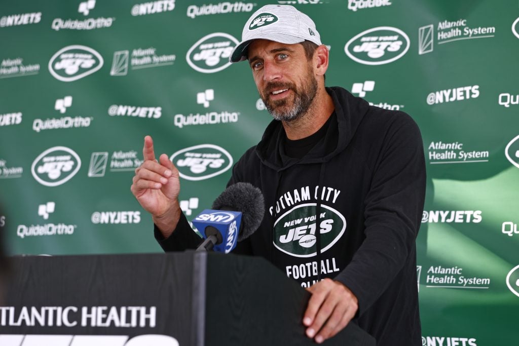 Quarterback Aaron Rodgers #8 of the New York Jets talks to reporters after training camp at Atlantic Health Jets Training Center on July 26, 2023 in Florham Park, New Jersey.