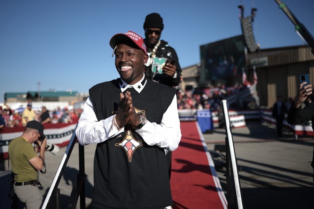 Former Pittsburgh Steelers players Antonio Brown and Le'Veon Bell leave the stage after Brown spoke in support of Republican presidential nominee, former U.S. President Donald Trump, during a campaign rally on October 19, 2024, in Latrobe, Pennsylvania.