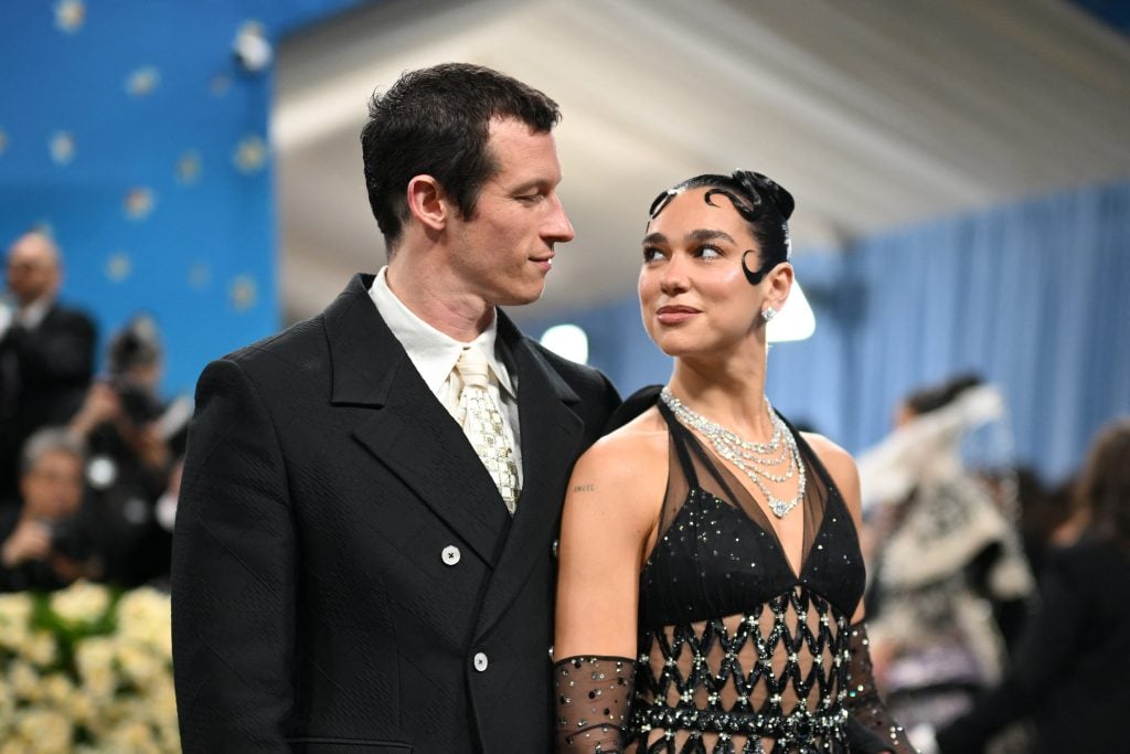 British-Albanian singer-songwriter Dua Lipa and British actor Callum Turner arrive for the 2025 Met Gala at the Metropolitan Museum of Art on May 5, 2025, in New York.