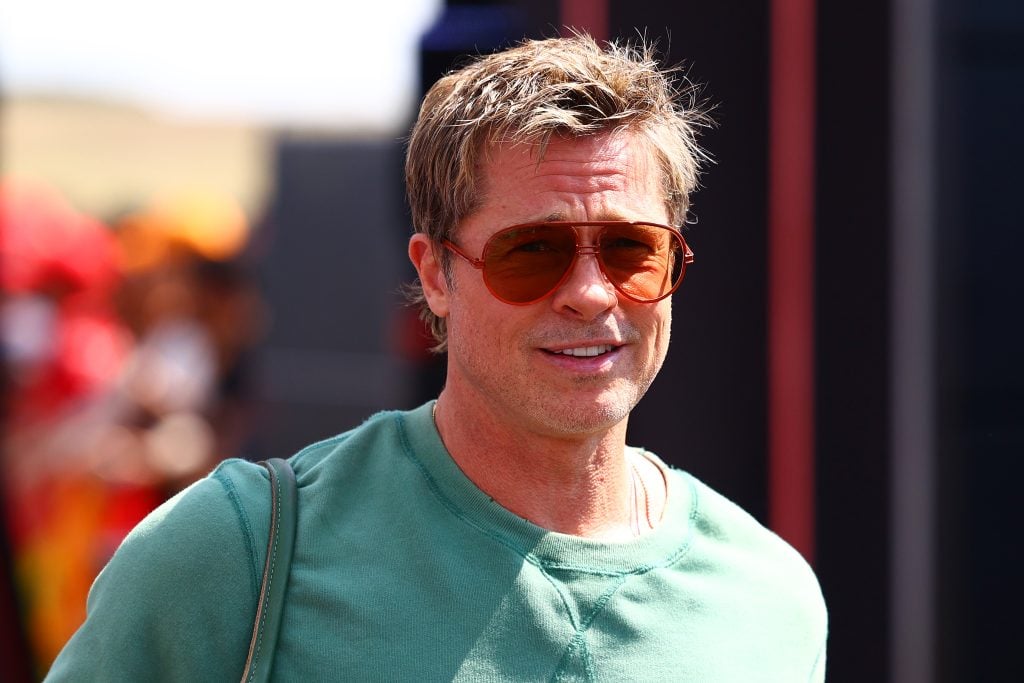 Brad Pitt, star of the upcoming Formula One based movie, F1, walks in the Paddock prior to practice ahead of the F1 Grand Prix of Hungary at Hungaroring on July 19, 2024 in Budapest, Hungary.